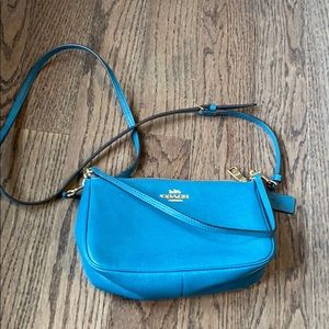 Authentic coach clutch